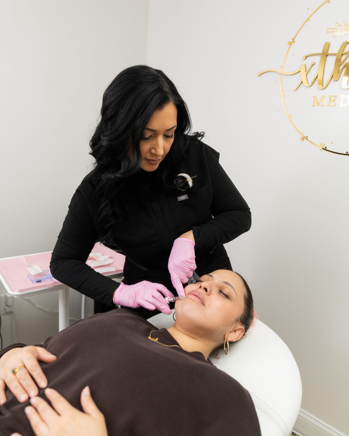 Leticia Camacho performing an aesthetic injectable treatment at Xthetics Med Spa